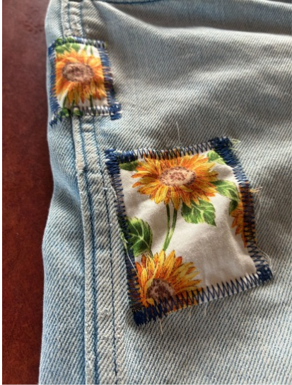 Patch mended jeans