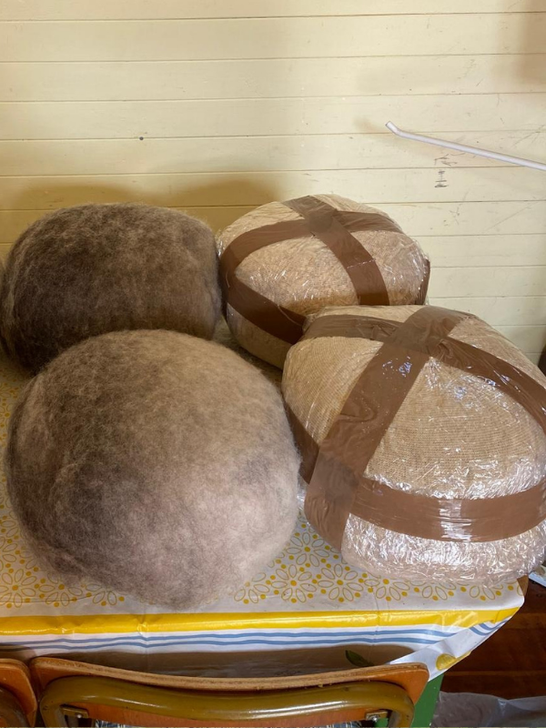 Felted boulders in various states of finished