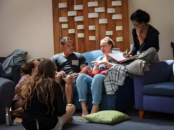 Group of people learning and talking together