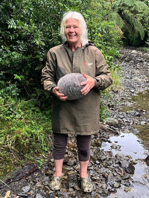 Hella holding felted boulder