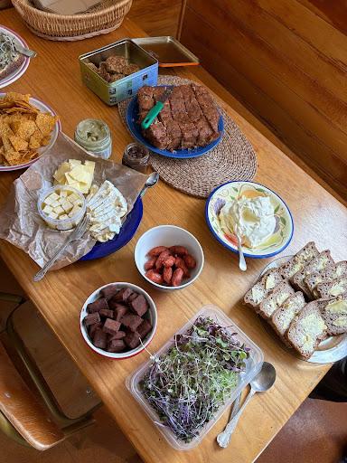 Lunch at Hellas with bread, cheese, cake and food from the permaculture garden