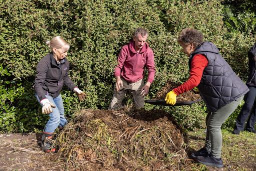 Students learning how to make a permaculture compost heap